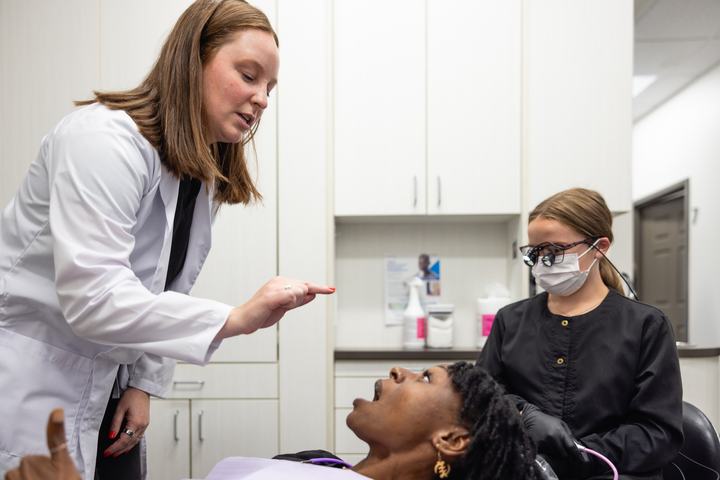 Doctor and assistant caring for a patient