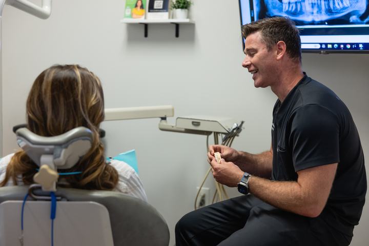 Doctor explaining treatment with a model