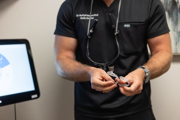Doctor explaining clear aligners